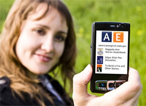 Photo of woman holding a cell phone 